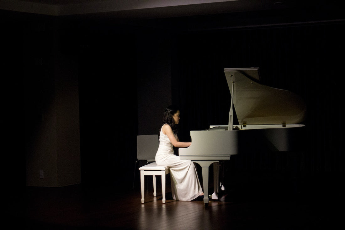 woman playing the piano