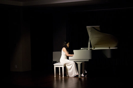 woman playing the piano