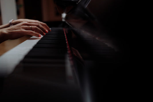 woman playing piano